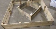 Recycled wooden pallet raised bed garden